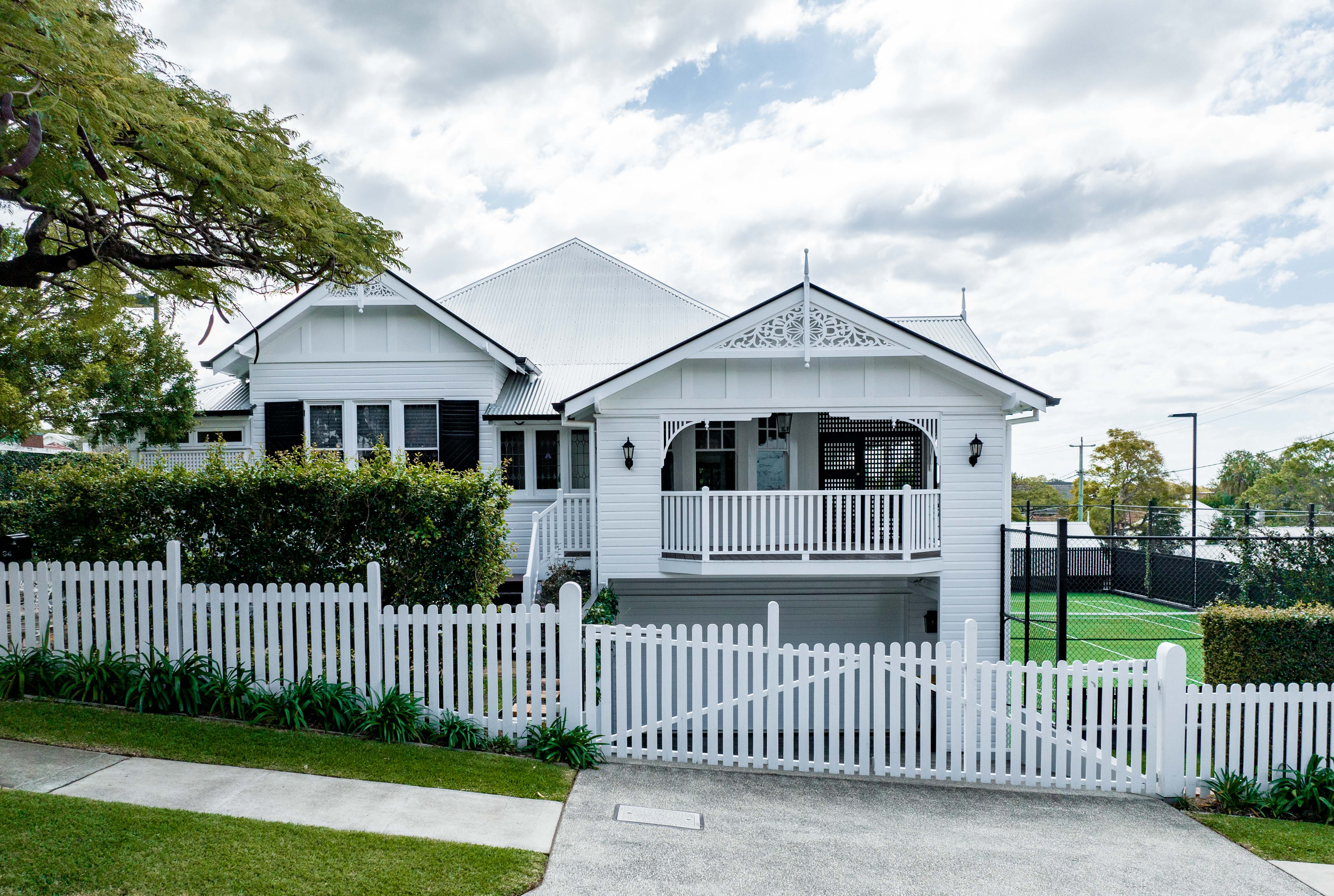 Completed luxury Queenslander home renovation with preserved heritage details in Clayfield Brisbane